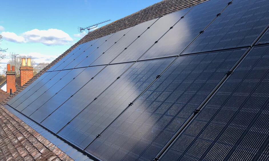 A row of solar panels installed on a residential rooftop in Bracknell, illustrating the benefits of solar energy