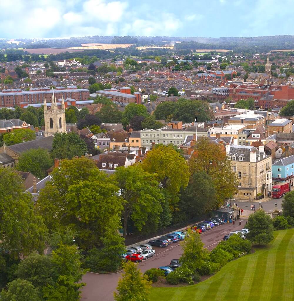 An aerial view of a Berkshire town with residential properties, illustrating the planning permission considerations for solar panel installations