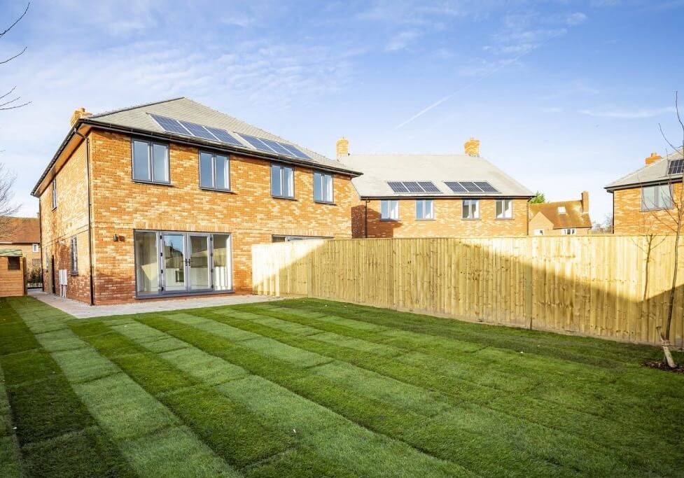 A view of a Woodley neighbourhood with residential properties, illustrating the planning permission considerations for solar panel installations
